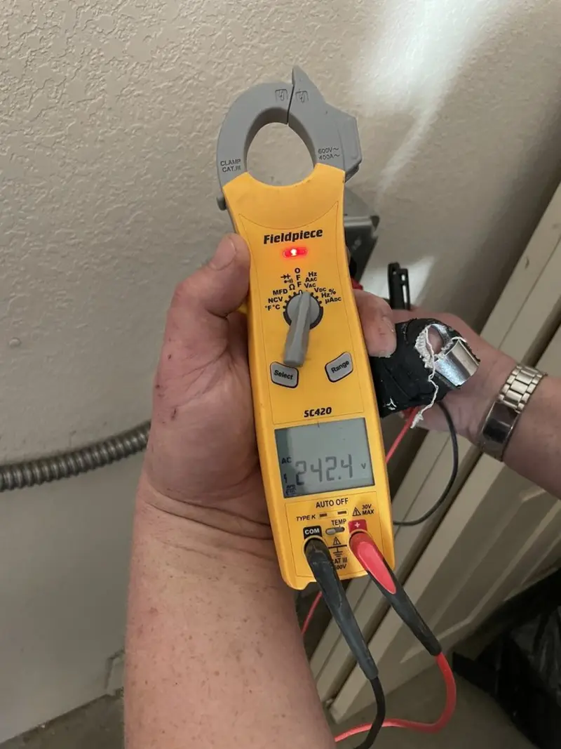 Voltage testing with clamp meter during Hot Tub / Pool Electrical Wiring in Buffalo